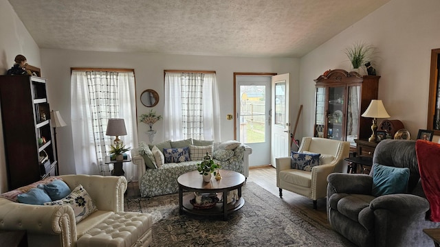 620 Lewis St, Washington Court House, OH 43160 - living room with wood finished floors and a textured ceiling