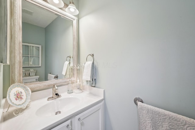6690 Hermitage Dr, Westerville, OH 43082 - bathroom featuring toilet, vanity, and visible vents