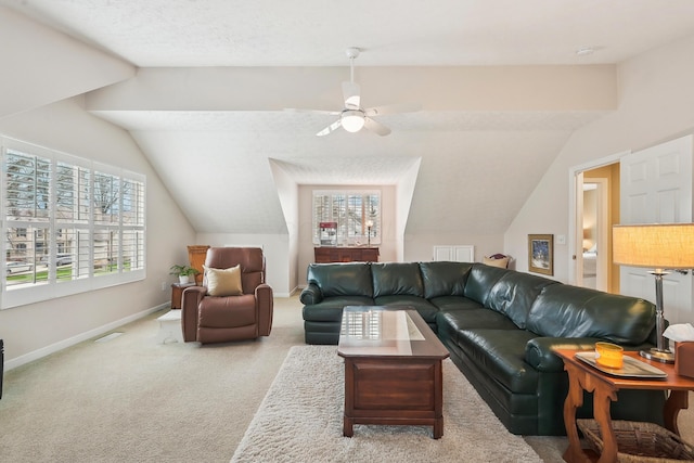 6690 Hermitage Dr, Westerville, OH 43082 - carpeted living area featuring lofted ceiling, a ceiling fan, baseboards, and visible vents