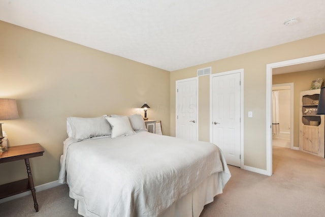 6690 Hermitage Dr, Westerville, OH 43082 - bedroom featuring baseboards, visible vents, and light colored carpet