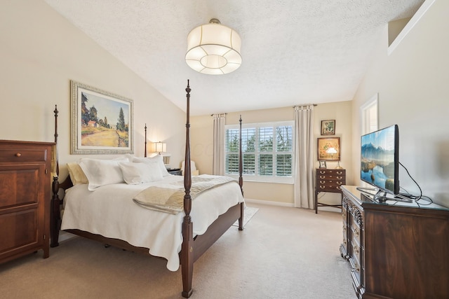 6690 Hermitage Dr, Westerville, OH 43082 - bedroom with vaulted ceiling, baseboards, a textured ceiling, and light colored carpet