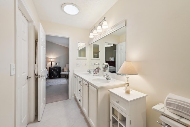 6690 Hermitage Dr, Westerville, OH 43082 - full bathroom featuring double vanity, tile patterned flooring, ensuite bathroom, and a sink