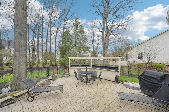 6690 Hermitage Dr, Westerville, OH 43082 - view of patio with fence, grilling area, and outdoor dining space
