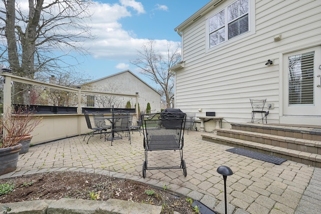 6690 Hermitage Dr, Westerville, OH 43082 - view of patio with an outdoor kitchen, area for grilling, and outdoor dining space