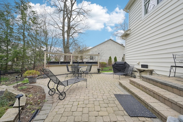 6690 Hermitage Dr, Westerville, OH 43082 - view of patio with grilling area, outdoor dining area, and fence