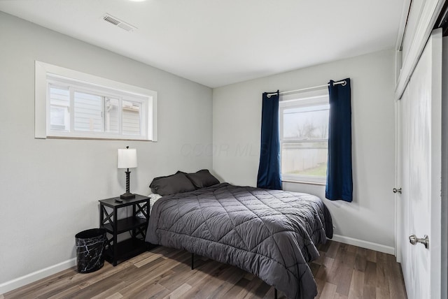 1779 Fairwood Ave, Columbus, OH 43207 - bedroom featuring visible vents, baseboards, and wood finished floors
