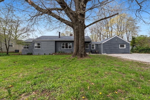 1779 Fairwood Ave, Columbus, OH 43207 - ranch-style house featuring a front lawn, a shingled roof, and driveway