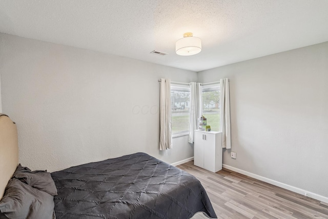 1779 Fairwood Ave, Columbus, OH 43207 - bedroom with visible vents, baseboards, and light wood-type flooring