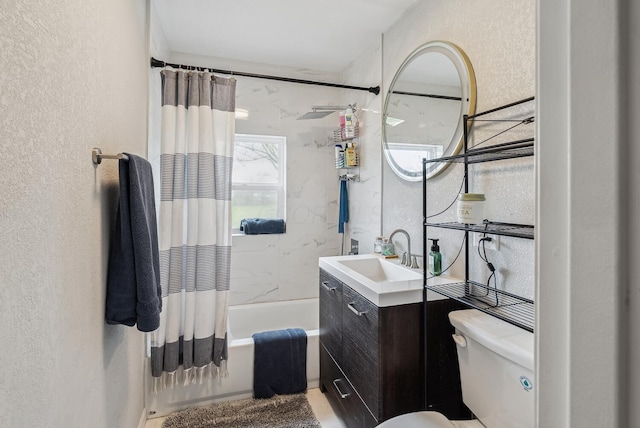 1779 Fairwood Ave, Columbus, OH 43207 - bathroom with toilet, shower / bathtub combination with curtain, vanity, and a textured wall