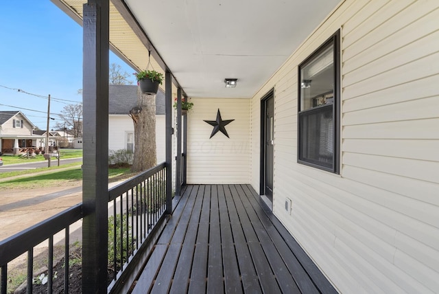 121 Granville St, Pataskala, OH 43062 - wooden deck featuring a porch