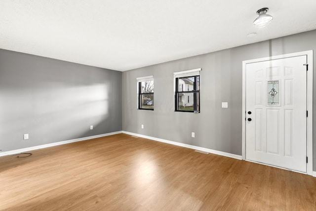121 Granville St, Pataskala, OH 43062 - entryway with wood finished floors, baseboards, and visible vents