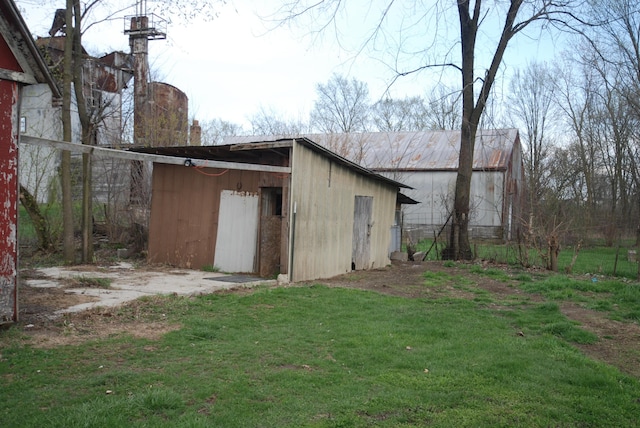 20543 Treaty Line Rd, West Mansfield, OH 43358 - view of pole building with a lawn