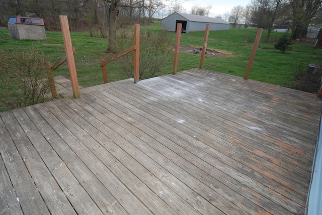 20543 Treaty Line Rd, West Mansfield, OH 43358 - wooden deck featuring a yard, an outdoor structure, and an outbuilding