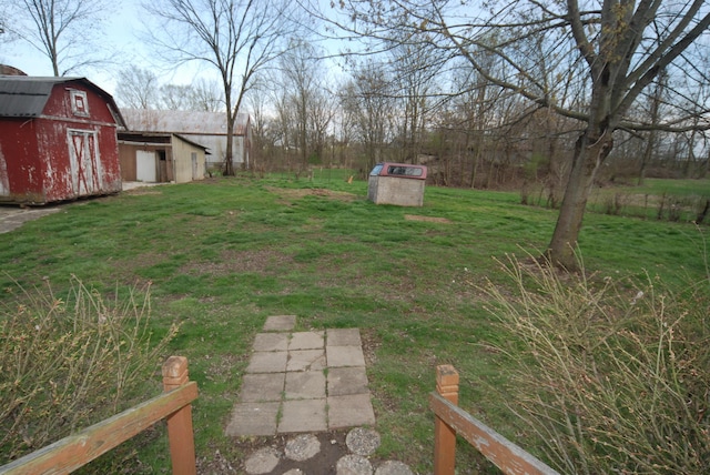 20543 Treaty Line Rd, West Mansfield, OH 43358 - view of yard featuring an outbuilding and a barn