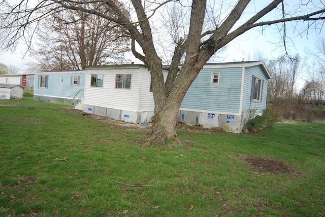 20543 Treaty Line Rd, West Mansfield, OH 43358 - view of side of property featuring crawl space and a lawn