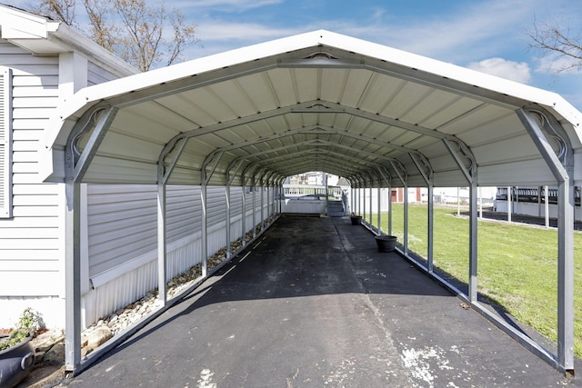 2445 Columbus Lancaster Rd NW Unit 147, Lancaster, OH 43130 - view of parking featuring a detached carport and aphalt driveway