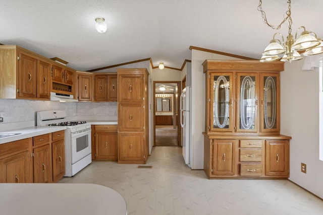 2445 Columbus Lancaster Rd NW Unit 147, Lancaster, OH 43130 - kitchen with white appliances, brown cabinetry, a chandelier, light countertops, and lofted ceiling