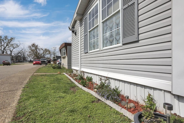 2445 Columbus Lancaster Rd NW Unit 147, Lancaster, OH 43130 - view of side of property with a yard and driveway