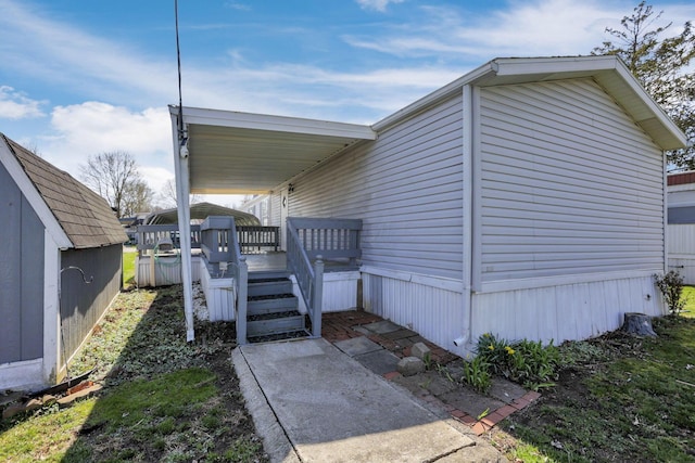 2445 Columbus Lancaster Rd NW Unit 147, Lancaster, OH 43130 - view of home's exterior with a wooden deck