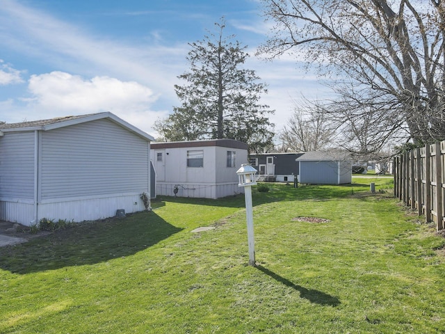 2445 Columbus Lancaster Rd NW Unit 147, Lancaster, OH 43130 - view of yard featuring fence