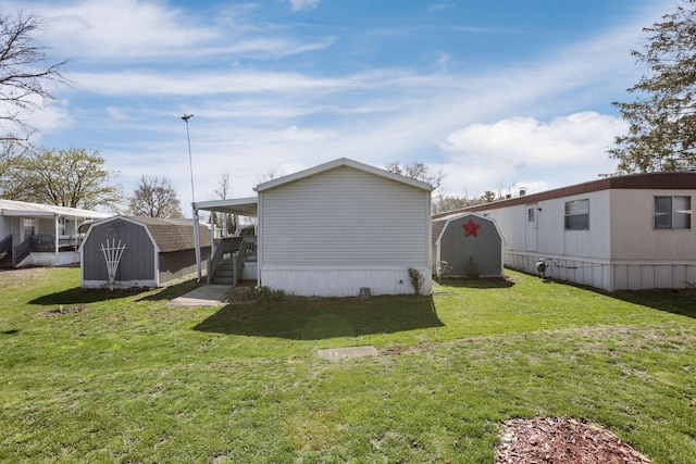 2445 Columbus Lancaster Rd NW Unit 147, Lancaster, OH 43130 - view of yard with an outdoor structure and a storage unit