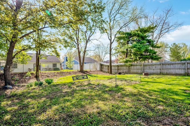 view of yard featuring fence