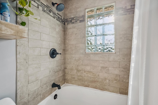 full bath featuring shower / washtub combination