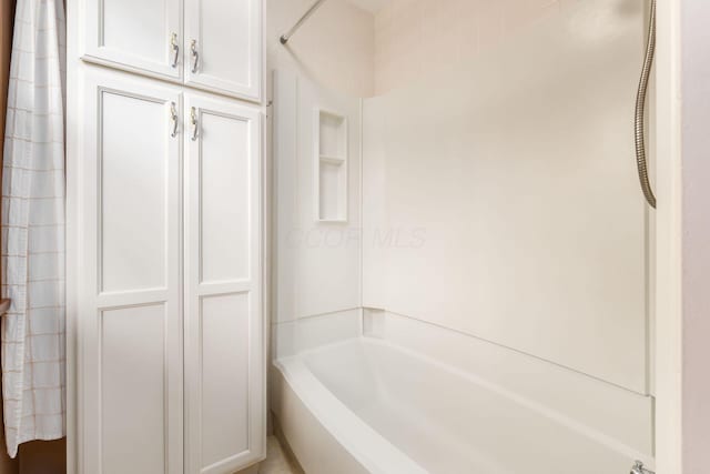 bathroom featuring tub / shower combination