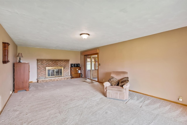 unfurnished living room with a fireplace, baseboards, and carpet flooring