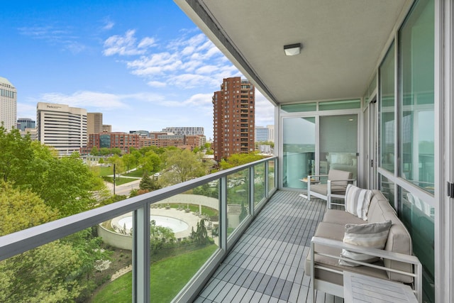 balcony featuring a city view