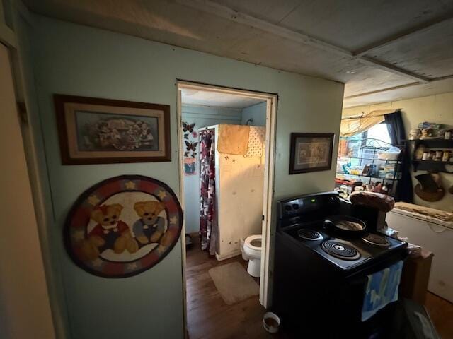 interior space featuring washer / dryer and wood finished floors