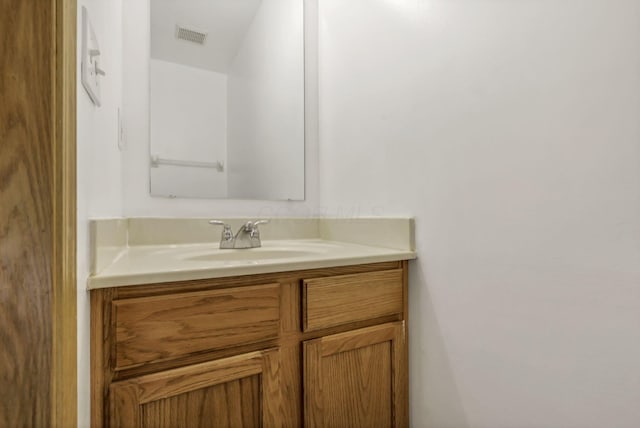 bathroom featuring visible vents and vanity