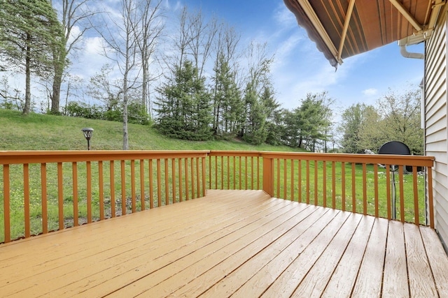 wooden deck with a yard