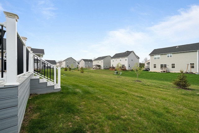 view of yard featuring a residential view