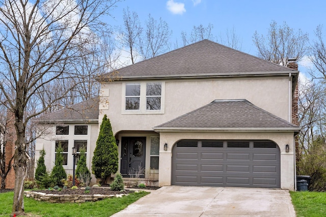 traditional-style home featuring concrete driveway, roof with shingles, a chimney, and stucco siding