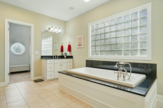 4201 Penrith Ct, Dublin, OH 43016 - full bath featuring a bath, baseboards, vanity, and tile patterned flooring