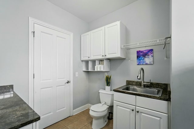 4201 Penrith Ct, Dublin, OH 43016 - bathroom with toilet, vanity, tile patterned floors, and baseboards