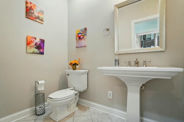 4201 Penrith Ct, Dublin, OH 43016 - bathroom with toilet, tile patterned flooring, a sink, and baseboards