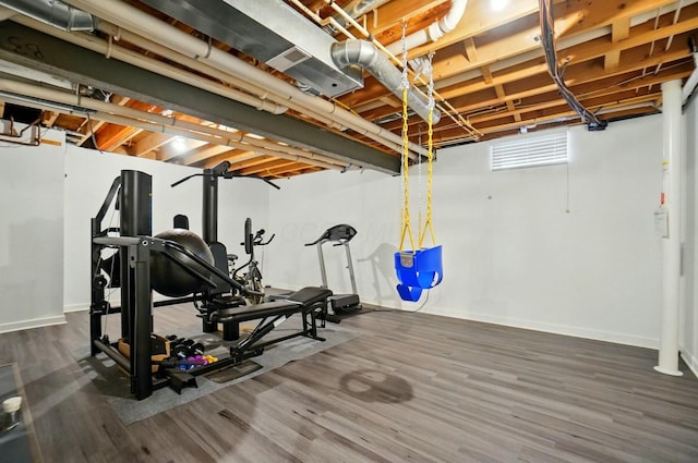 4201 Penrith Ct, Dublin, OH 43016 - workout area with wood finished floors and baseboards