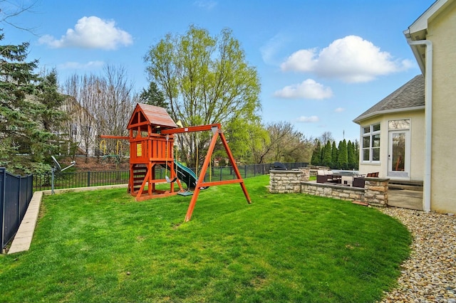 4201 Penrith Ct, Dublin, OH 43016 - view of jungle gym with a fenced backyard, an outdoor living space with a fire pit, and a lawn