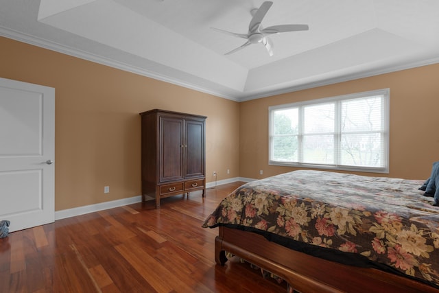 6700 Ballantrae Pl, Dublin, OH 43016 - bedroom with wood finished floors, a tray ceiling, a ceiling fan, and crown molding