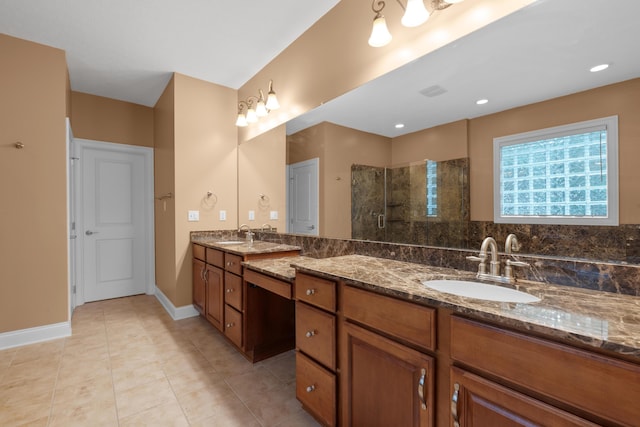 6700 Ballantrae Pl, Dublin, OH 43016 - full bathroom with tile patterned floors, tiled shower, vanity, and baseboards