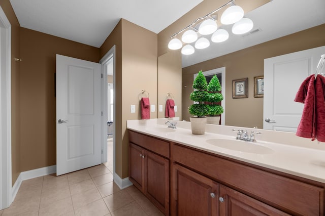 6700 Ballantrae Pl, Dublin, OH 43016 - full bathroom with baseboards, visible vents, a sink, and double vanity