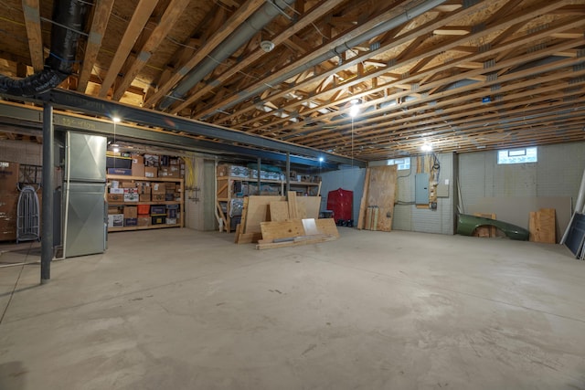 6700 Ballantrae Pl, Dublin, OH 43016 - basement with electric panel and freestanding refrigerator