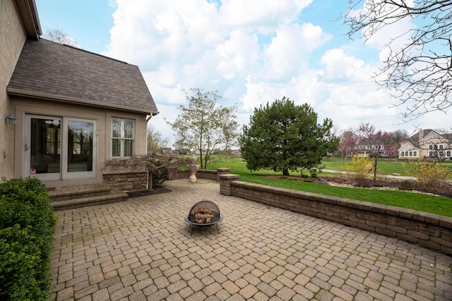 6700 Ballantrae Pl, Dublin, OH 43016 - view of patio featuring an outdoor fire pit