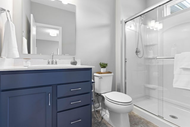 full bath with toilet, a shower stall, and vanity