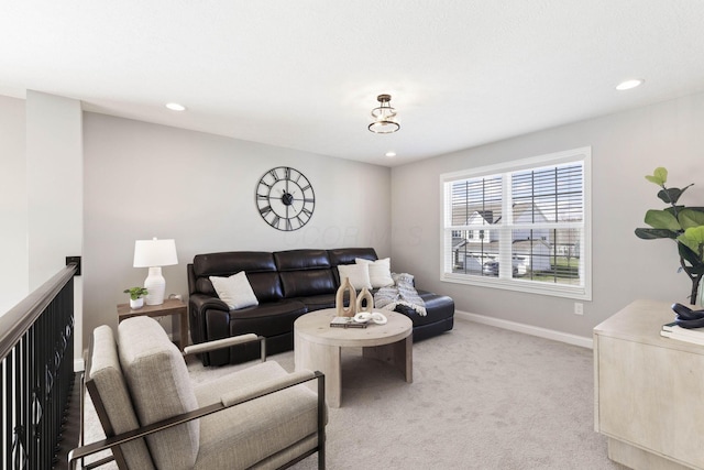 living area featuring light carpet, baseboards, and recessed lighting