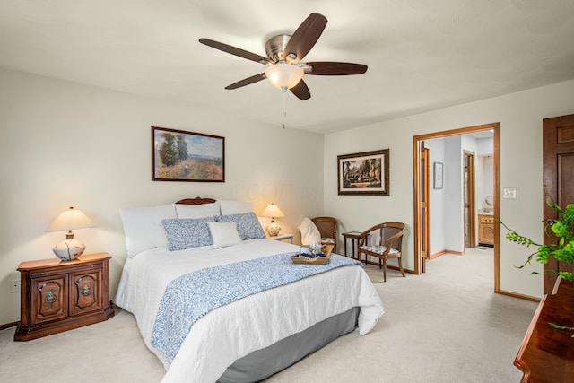 bedroom featuring ceiling fan, baseboards, and light carpet