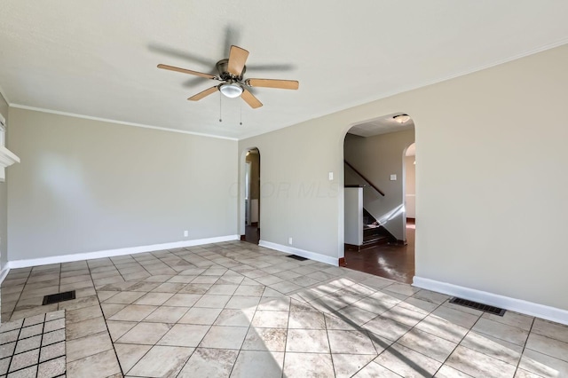 595 Collingwood Ave, Columbus, OH 43213 - spare room with visible vents, arched walkways, ceiling fan, and crown molding