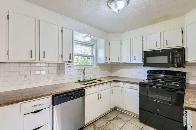 595 Collingwood Ave, Columbus, OH 43213 - kitchen featuring a textured ceiling, white cabinetry, a sink, and black appliances